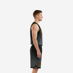 Side view of men's custom black basketball uniform showing gold pinstripe pattern on jersey and shorts