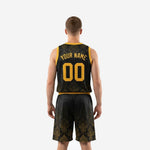 Opposite side view of black and gold sublimated basketball uniform set with gold waistband and shorts leg number detail