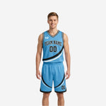 Front view of custom black and sky-blue reversible basketball uniform set with arched team name and number 00 on black jersey and matching shorts