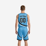 Other side view of the sky-blue and black reversible basketball uniform set showing light side out with matching shorts swirl detail
