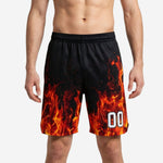 Black custom basketball shorts with photorealistic orange-red flame sublimation rising from hem, player number 00 on right thigh, front view