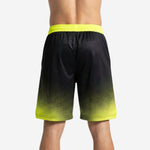 Left side view of men's black and neon yellow sublimated basketball shorts showing side split hem detail and full-dye gradient print