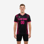 Front detail of mens black soccer training jersey with hot pink V-neck collar, sleeve cuffs, and diagonal stripe sublimation pattern
