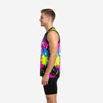 Front view of black neon custom printed basketball jersey with cyan magenta and yellow paint splash sublimation and arced team name on chest