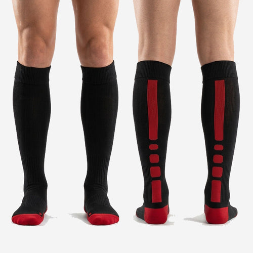 Full-length pair of custom red and black soccer socks displayed over the calf with ribbed cuff band