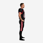 Custom team football uniform black and red reverse side view showing sleeve stripe detail and pant side stripe alignment