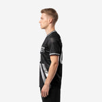 Right side view of black silver custom sublimation soccer shirt showing chevron stripe graphic