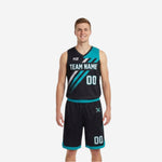 Black and teal reversible basketball uniforms showing black side front and teal side front of the full 2-piece set