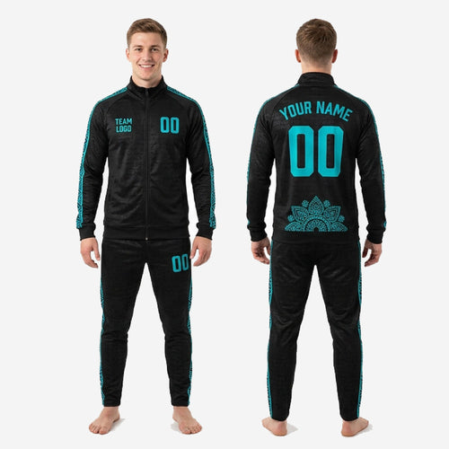 Full 2-piece black and teal sublimated soccer tracksuit set showing jacket and matching tapered pants on adult male model