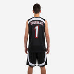 Opposite side view of black youth basketball uniform showing matching white curved side panel design on shorts and clean armhole binding on jersey