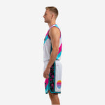 Custom basketball uniform set white and hot pink vaporwave style side profile with sunset graphic shorts