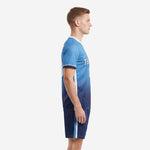Custom sublimated soccer uniform with sky blue to navy fade and white side panel, left side view