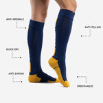 Blue and gold soccer socks sole view showing reinforced cushioned footbed and Athletic Gold toe cap