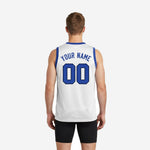 Opposite side view of white and royal blue basketball jersey showing side vent at hip and flat armhole binding detail on performance polyester fabric