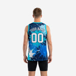 Right-side view of custom sublimated teal and navy basketball jersey showing open armhole binding and splash pattern extending to side panel