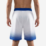 Back view of custom blue and white basketball shorts with full-dye sublimation halftone fade and royal blue waistband detail