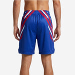 Alternate side view of custom sublimated basketball shorts in royal blue showing star field and side split at the leg hem opening