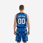 Back view of blue and white basketball uniforms showing player name and back number printed on full digital-pixel camo sublimated jersey