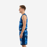Right side view of custom blue and white basketball uniforms displaying three-tone pixel camo on both jersey and shorts with white number on shorts leg