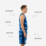 Close detail of blue digital-pixel camo basketball shorts with elastic waistband navy contrast band and white number on lower leg