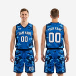 Full set view of custom blue and white basketball uniforms with matching digital-pixel camo jersey and shorts for full roster orders