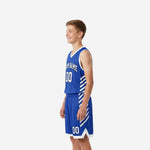 Side view of royal blue and white youth basketball uniform showing diagonal stripe side panel accents on jersey and shorts