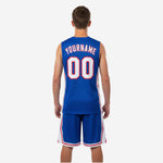 Back view of blue and white youth basketball uniform showing back number and player name print zones on royal blue sublimated jersey