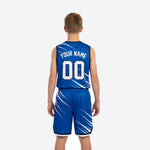 Back view of royal blue youth basketball uniform showing player name and number print zones on jersey and shorts