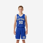 Blue and white youth basketball uniforms full set front and back view with royal blue jersey and matching shorts