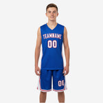 Blue and white youth basketball uniforms front view showing royal blue jersey with white side panels red accent stripe arced team name and number 00