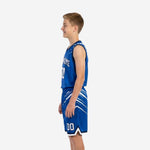 Left side view of custom blue and white youth basketball jersey and shorts showing slash stripe detail across shorts panels