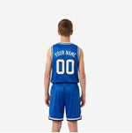 Opposite side view of royal blue and white custom youth basketball jersey and shorts set with armhole trim detail