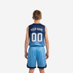 Opposite side view of youth basketball uniform set in navy and sky blue with matching elastic waistband and sublimated hex texture on shorts