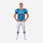 Blue and white youth football uniforms front view showing sky-blue jersey with navy shoulder panels and white pants with navy side stripe, number 20