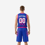 Back view of royal blue sublimated basketball jersey showing back name and number print zones with claw-mark design continuing from front panel