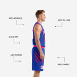 Close detail of royal blue basketball shorts with hot pink claw-mark sublimation on both legs and white player number on lower left leg