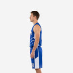 Royal blue basketball uniform side view showing white chevron accent lines on jersey and full-length white side panel on shorts