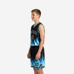 Blue flame custom boys basketball uniforms front view showing arched team name and number 00 on black sublimated jersey and matching shorts