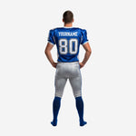 opposite side view of custom blue football uniform showing sleeve number placement and silver pant leg stripe with white accent