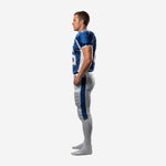 Opposite side view of the sublimated blue football uniform and grey pants showing the matching side stripe running hip to ankle