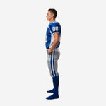 close side panel detail of royal blue sublimated football jersey with white and silver shoulder panels and matching silver football pants