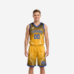 Gold side of the blue and gold reversible basketball uniform set with lightning bolt pattern, blue team name, and blue number 00 on shorts