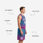 Full front view of custom blue and pink basketball uniform package showing arced team name chest print and coordinating shorts number