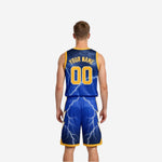 Side view of the royal blue and gold reversible basketball uniform showing armhole binding and side panel construction