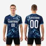 Blue soccer training jersey sublimation detail showing Ice Blue geometric shard pattern on Navy Blue 100 percent polyester performance knit fabric
