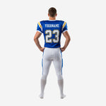 Back view of royal blue custom American football team uniform showing back number and nameplate area on white pant set