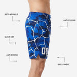 Close detail of white crackle lines and camo pattern on custom blue basketball shorts showing colorfast sublimated print quality