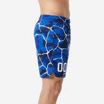 Side view of custom blue and white basketball shorts showing elastic waistband, side pocket, and full-panel camo sublimation print