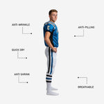 Back detail of blue and white custom youth American football uniforms with sublimated back number and matching white pant with blue and black side stripe panel