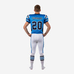 Second side view of custom royal blue and navy youth football uniform showing matching jersey and pant stripe alignment